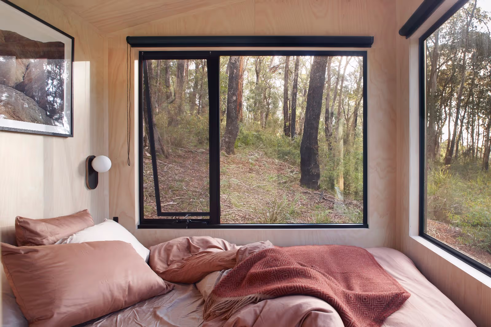 tall tiny house bedroom overlooking nature